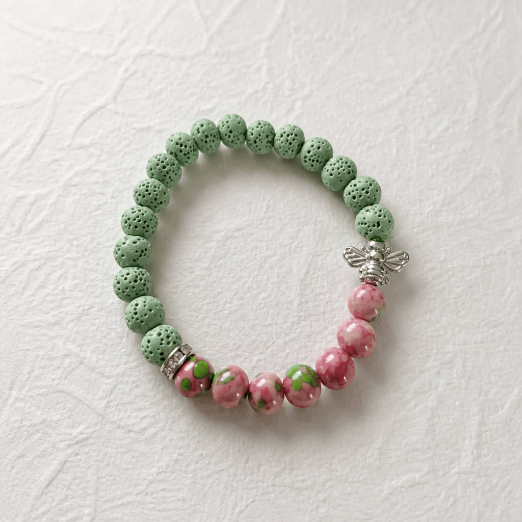 Butineuse enchantée | Pierre de lave et cloisonné en fleurs rose | Bracelet diffuseur - Bijoux LavaLife