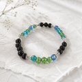 Reflets d'Océan | Verre facetté bleu & vert et pierre de lave | Bracelet diffuseur - Bijoux LavaLife